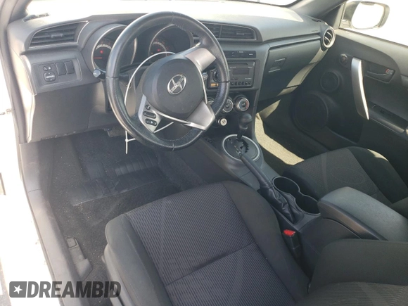 2013 Scion tC z VIN JTKJF5C77D3063067, wystawiony jako Copart lot #54264625 z przebiegiem 74 351 mil mil oraz Szkoda całkowita • Salvage title. Historia ofert i sprzedaży dostępna na DreamBid. Obrazek 8.