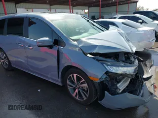 2024 Honda Odyssey Touring with VIN 5FNRL6H82RB027601, listed as a IAAI auction lot 41808680 with 25,911 mi miles and . Bid and sale history available at DreamBid. Image 17.