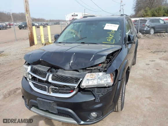 2013 Dodge Journey SXT with VIN 3C4PDCBBXDT675818, listed as a IAAI auction lot 41797205 with 141,271 mi miles. Bid and sale history available at carsss.com. Image 17.