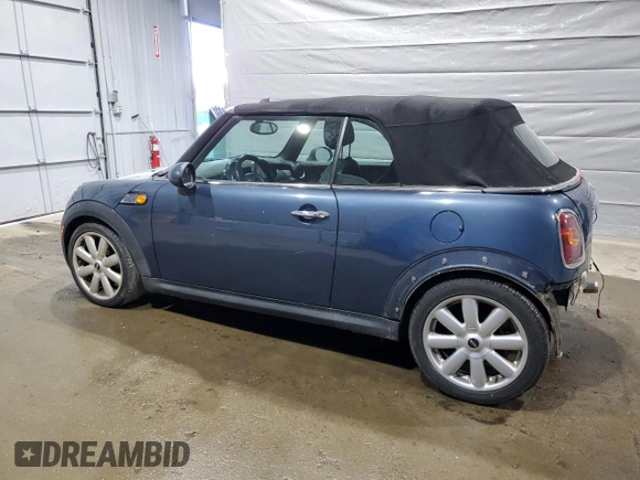 2009 MINI Convertible z VIN WMWMR335X9TJ93685, wystawiony jako Copart lot #50899755 z przebiegiem 123 609 mil mil oraz Szkoda całkowita • Salvage title. Historia ofert i sprzedaży dostępna na DreamBid. Obrazek 2.