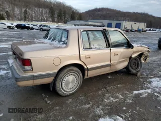 1989 Plymouth Acclaim z VIN 1P3BA46K6KF514487, wystawiony jako Copart lot #86534244 z przebiegiem 90 135 mil mil oraz Szkody całkowita. Historia ofert i sprzedaży dostępna na DreamBid. Obrazek 3.