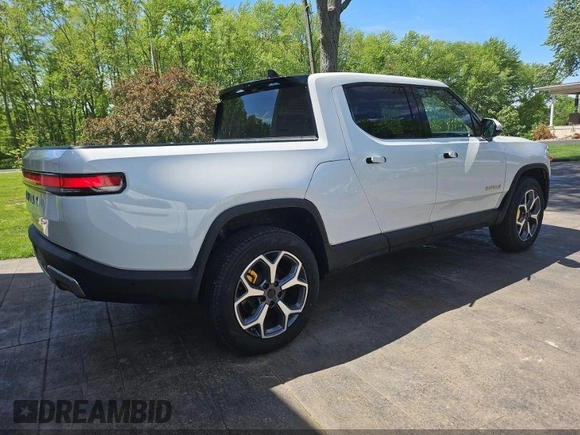 2023 Rivian R1T Adventure z VIN 7FCTGAAA1PN020478, wystawiony jako IAAI lot #42361936 z przebiegiem 443 mil mil oraz . Historia ofert i sprzedaży dostępna na DreamBid. Obrazek 4.