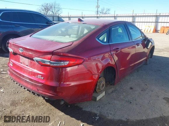 2019 Ford Fusion Hybrid SE with VIN 3FA6P0LU5KR189838, listed as a IAAI auction lot 41407401 with 134,834 mi miles. Bid and sale history available at carsss.com. Image 4.