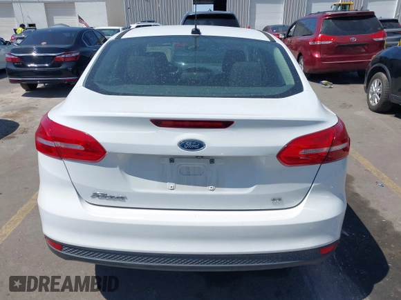 2017 Ford Focus SE with VIN 1FADP3F24HL232527, listed as a IAAI auction lot 42110702 with 95,327 mi miles and . Bid and sale history available at DreamBid. Image 17.