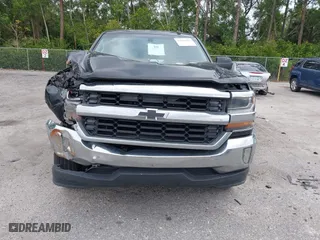 2016 Chevrolet Silverado 1500 LT with VIN 1GCRCREC8GZ346504, listed as a IAAI auction lot 41908141 with 201,018 mi miles. Bid and sale history available at carsss.com. Image 6.