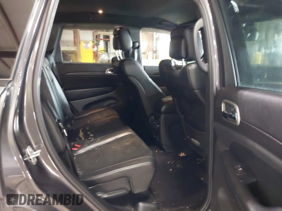 2018 Jeep Grand Cherokee Laredo E with VIN 1C4RJFAG5JC343101, listed as a IAAI auction lot 41211158 with 105,886 mi miles. Bid and sale history available at carsss.com. Image 8.