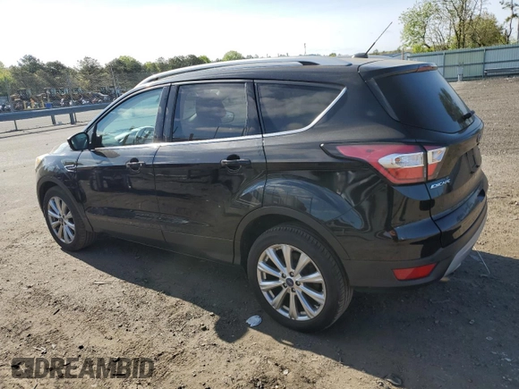 2017 Ford Escape Titanium with VIN 1FMCU9JD3HUD63223, listed as a Copart auction lot 53370004 with 128,666 mi miles and Non Repairable. Bid and sale history available at carsss.com. Image 2.
