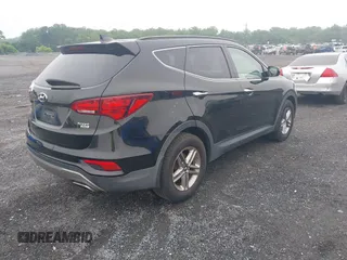 2017 Hyundai Santa Fe 2.4L with VIN 5NMZUDLB8HH009282, listed as a IAAI auction lot 42512122 with 81,744 mi miles and . Bid and sale history available at DreamBid. Image 4.