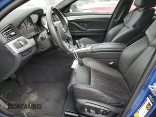 2014 BMW M5 z VIN WBSFV9C5XED097563, wystawiony jako Copart lot #72175354 z przebiegiem 73 406 mil mil oraz Szkody całkowita. Historia ofert i sprzedaży dostępna na DreamBid. Obrazek 7.