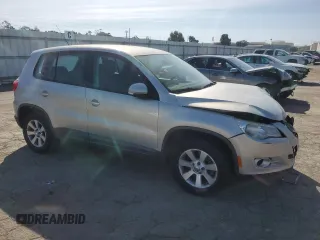 2010 Volkswagen Tiguan S with VIN WVGAV7AX9AW519312, listed as a Copart auction lot 48633055 with 94,740 mi miles and Salvage title. Bid and sale history available at DreamBid. Image 4.