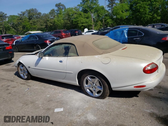 1999 Jaguar XK with VIN SAJGX2043XC040866, listed as a Copart auction lot 53712555 with 65,349 mi miles and Clean Title. Bid and sale history available at DreamBid. Image 2.