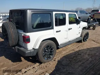 2023 Jeep Wrangler 4xe Sahara with VIN 1C4JJXP61PW553364, listed as a IAAI auction lot 41747111 with 22,127 mi miles. Bid and sale history available at carsss.com. Image 4.