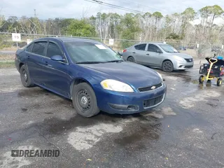 2014 Chevrolet Impala Limited Police Police with VIN 2G1WD5E34E1133735, listed as a IAAI auction lot 41573966 with 239,533 mi miles. Bid and sale history available at carsss.com. Image 1.
