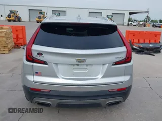2019 Cadillac XT4 FWD Premium Luxury z VIN 1GYFZCR42KF189610, wystawiony jako IAAI lot #42137690 z przebiegiem 92 502 mil mil oraz . Historia ofert i sprzedaży dostępna na DreamBid. Obrazek 17.