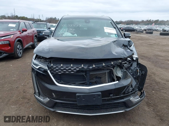2021 Cadillac XT6 Premium Luxury with VIN 1GYKPCRSXMZ222454, listed as a IAAI auction lot 41648439 with 113,547 mi miles and . Bid and sale history available at carsss.com. Image 12.