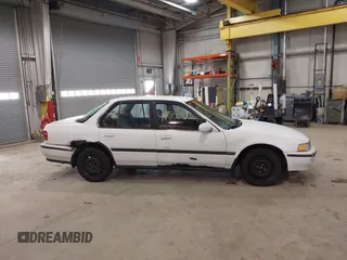 1993 Honda Accord z VIN 1HGCB7651PA022436, wystawiony jako IAAI lot #41785092 z przebiegiem Nie podano mil oraz . Historia ofert i sprzedaży dostępna na DreamBid. Obrazek 13.