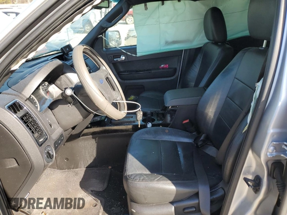 2010 Ford Escape Limited with VIN 1FMCU0E71AKC71285, listed as a Copart auction lot 61344164 with 163,471 mi miles and Salvage title. Bid and sale history available at DreamBid. Image 7.