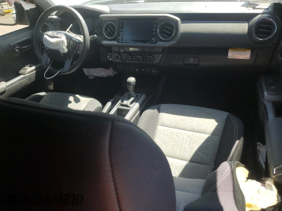 2023 Toyota Tacoma SR with VIN 3TYCZ5AN9PT131515, listed as a Copart auction lot 57900865 with Not provided miles and Salvage title. Bid and sale history available at DreamBid. Image 8.