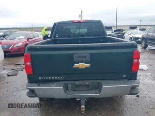2014 Chevrolet Silverado 1500 LT with VIN 1GCRCREH7EZ340962, listed as a IAAI auction lot 41470994 with 179,326 mi miles and . Bid and sale history available at DreamBid. Image 16.
