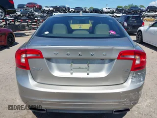 2015 Volvo S60 T5 Drive-E Premier Plus with VIN YV140MFC9F1318920, listed as a IAAI auction lot 41930684 with 66,790 mi miles. Bid and sale history available at carsss.com. Image 16.