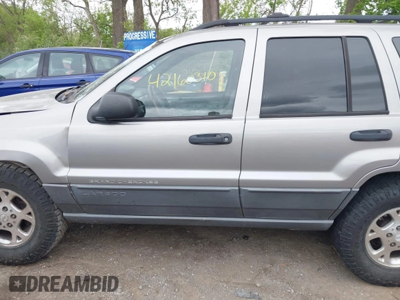 2001 Jeep Grand Cherokee Laredo z VIN 1J4GW48S01C658017, wystawiony jako IAAI lot #42160310 z przebiegiem 220 309 mil mil oraz . Historia ofert i sprzedaży dostępna na DreamBid. Obrazek 15.