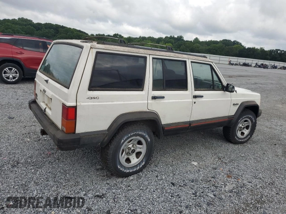 1996 Jeep Cherokee Sport z VIN 1J4FJ68S3TL103684, wystawiony jako Copart lot #63466265 z przebiegiem 163 715 mil mil oraz Czysty tytuł • Clean title. Historia ofert i sprzedaży dostępna na DreamBid. Obrazek 3.