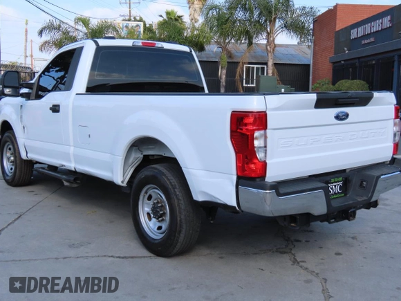 2022 Ford F-350 XL with VIN 1FTRF3A66NEG41366, listed as a Copart auction lot 55134315 with 34,356 mi miles and Salvage title. Bid and sale history available at DreamBid. Image 4.