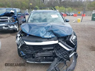 2023 Kia Sportage EX with VIN KNDPVCAGXP7104090, listed as a IAAI auction lot 42144158 with 26,983 mi miles and . Bid and sale history available at DreamBid. Image 13.