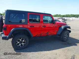 2021 Jeep Wrangler Unlimited Rubicon with VIN 1C4HJXFG2MW575541, listed as a IAAI auction lot 42247475 with 92,353 mi miles and . Bid and sale history available at DreamBid. Image 14.