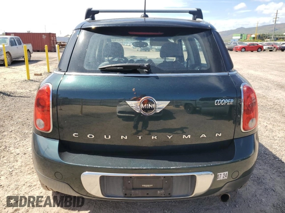 2014 MINI Countryman with VIN WMWZB3C51EWR40111, listed as a Copart auction lot 50274045 with 138,073 mi miles and Salvage title. Bid and sale history available at DreamBid. Image 6.