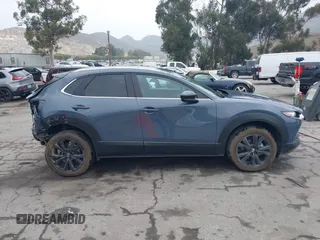 2022 Mazda CX-30 S Carbon Edition with VIN 3MVDMBCL0NM456154, listed as a IAAI auction lot 42153202 with 40,372 mi miles and . Bid and sale history available at DreamBid. Image 13.