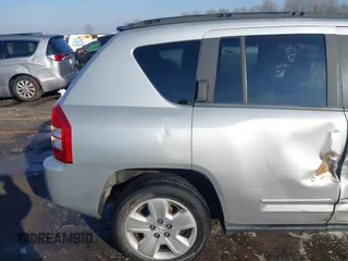 2008 Jeep Compass Sport with VIN 1J8FT47098D665734, listed as a IAAI auction lot 41561801 with 169,446 mi miles. Bid and sale history available at carsss.com. Image 18.