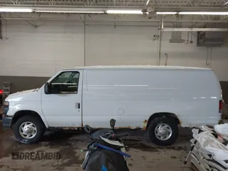 2010 Ford Econoline Cargo Commercial with VIN 1FTNS2EW4ADA15359, listed as a IAAI auction lot 41450356 with 187,685 mi miles and . Bid and sale history available at carsss.com. Image 14.