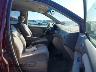 2002 Toyota Sienna CE with VIN 4T3ZF19C62U450159, listed as a IAAI auction lot 41222098 with 251,767 mi miles. Bid and sale history available at carsss.com. Image 5.