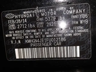 2015 Hyundai Genesis 3.8L with VIN KMHGN4JE1FU012186, listed as a IAAI auction lot 41753637 with 91,241 mi miles. Bid and sale history available at carsss.com. Image 9.