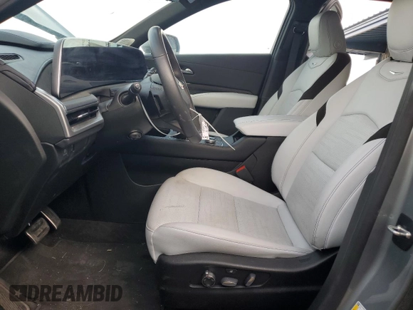 2024 Cadillac XT4 AWD Sport with VIN 1GYFZFR49RF134390, listed as a Copart auction lot 73012834 with 6,092 mi miles and Salvage title. Bid and sale history available at DreamBid. Image 7.
