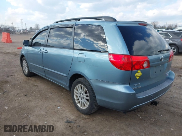 2007 Toyota Sienna XLE with VIN 5TDZK22C37S053965, listed as a IAAI auction lot 41902226 with 239,910 mi miles. Bid and sale history available at carsss.com. Image 3.