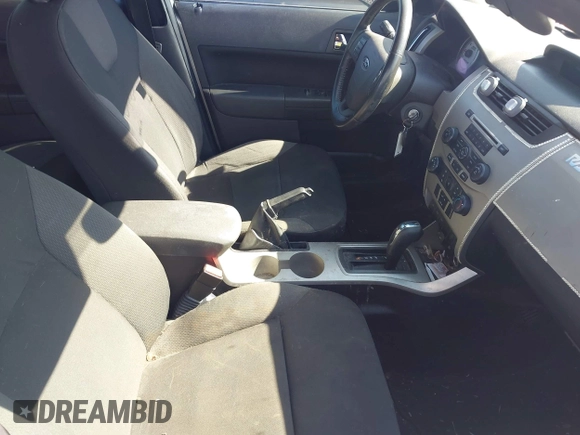 2008 Ford Focus SE with VIN 1FAHP35N48W243314, listed as a IAAI auction lot 42001321 with 210,639 mi miles. Bid and sale history available at carsss.com. Image 5.