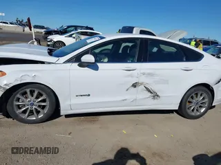 2018 Ford Fusion SE z VIN 3FA6P0LU3JR102971, wystawiony jako IAAI lot #41814321 z przebiegiem 135 472 mil mil oraz . Historia ofert i sprzedaży dostępna na DreamBid. Obrazek 14.