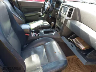2010 Jeep Grand Cherokee Laredo with VIN 1J4PS4GK0AC112654, listed as a IAAI auction lot 41809445 with 418,301 mi miles. Bid and sale history available at carsss.com. Image 5.