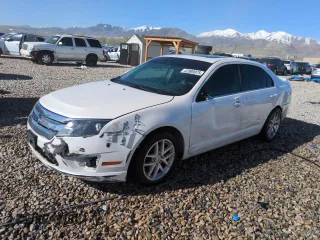 2012 Ford Fusion SEL z VIN 3FAHP0JA7CR434058, wystawiony jako Copart lot #52989875 z przebiegiem 109 914 mil mil oraz Szkody całkowita. Historia ofert i sprzedaży dostępna na DreamBid. Obrazek 1.