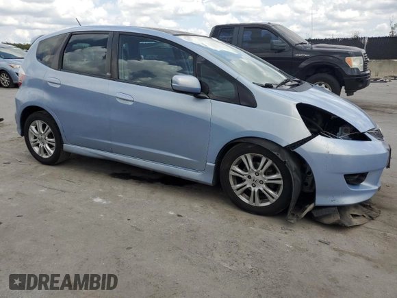 2010 Honda Fit Sport with VIN JHMGE8H64AC032634, listed as a Copart auction lot 61795825 with 143,593 mi miles and Salvage title. Bid and sale history available at DreamBid. Image 4.