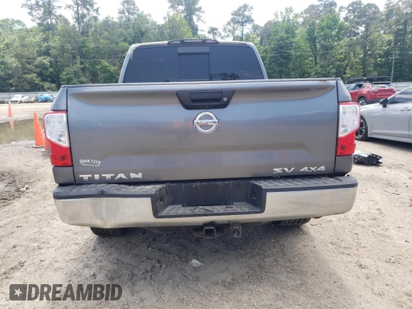 2018 Nissan Titan SV z VIN 1N6AA1EJ8JN514883, wystawiony jako Copart lot #56508115 z przebiegiem 207 605 mil mil oraz Szkoda całkowita • Salvage title. Historia ofert i sprzedaży dostępna na DreamBid. Obrazek 6.