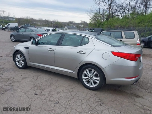2011 Kia Optima EX with VIN KNAGN4A78B5127441, listed as a IAAI auction lot 41995129 with 57,145 mi miles. Bid and sale history available at carsss.com. Image 3.