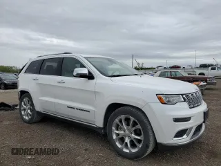 2019 Jeep Grand Cherokee Summit with VIN 1C4RJFJT4KC848996, listed as a Copart auction lot 54974925 with 106,517 mi miles and Salvage title. Bid and sale history available at DreamBid. Image 4.