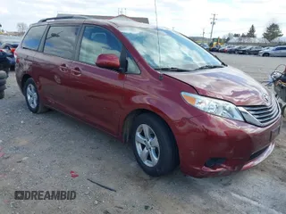 2014 Toyota Sienna LE AAS with VIN 5TDKK3DC6ES527036, listed as a IAAI auction lot 41895047 with 90,573 mi miles. Bid and sale history available at carsss.com. Image 1.