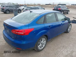 2018 Ford Focus SE with VIN 1FADP3F23JL210539, listed as a IAAI auction lot 41921226 with 100,609 mi miles. Bid and sale history available at carsss.com. Image 4.