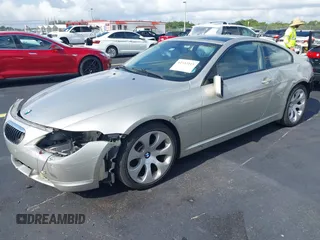 2005 BMW 6 Series 645Ci z VIN WBAEH73445B191324, wystawiony jako IAAI lot #42333115 z przebiegiem 77 317 mil mil oraz . Historia ofert i sprzedaży dostępna na DreamBid. Obrazek 2.