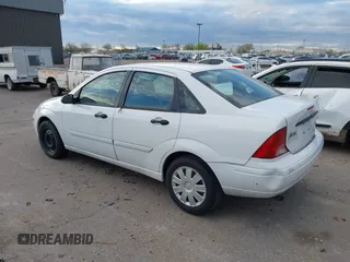 2004 Ford Focus SE with VIN 1FAFP34394W199845, listed as a IAAI auction lot 41896239 with 98,464 mi miles and . Bid and sale history available at DreamBid. Image 3.