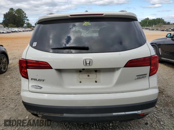 2017 Honda Pilot Touring z VIN 5FNYF6H92HB067140, wystawiony jako Copart lot #72200584 z przebiegiem 127 856 mil mil oraz Szkoda całkowita • Salvage title. Historia ofert i sprzedaży dostępna na DreamBid. Obrazek 6.